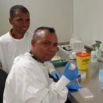Joaquim and Abel learn how to carry out diagnostic tests in the Darwin DAFF laboratory (Enzyme-linked immunosorbent assay, ELISA).