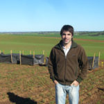 Guillermo Divito looking at crop and pasture legumes