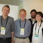 TAS Scholars Mr Gavin Livingston (left), Mr Michael Tarbath (3rd from left), Ms Kaylia Cameron (right) with TAS Coordinator, Dr Neville Mendham (middle)
