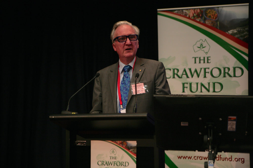 Dr Blight presenting a short summary at the Parliamentary Conference